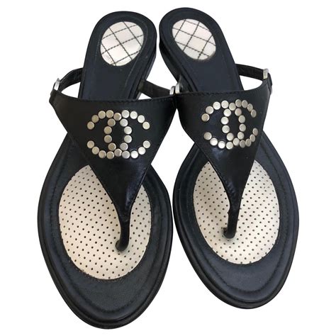 black and white chanel slides|chanel black flip flops.